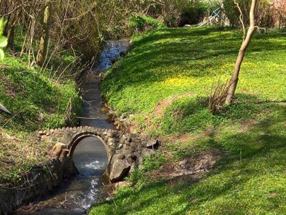 The stream running through the estate at Vintre Møller.