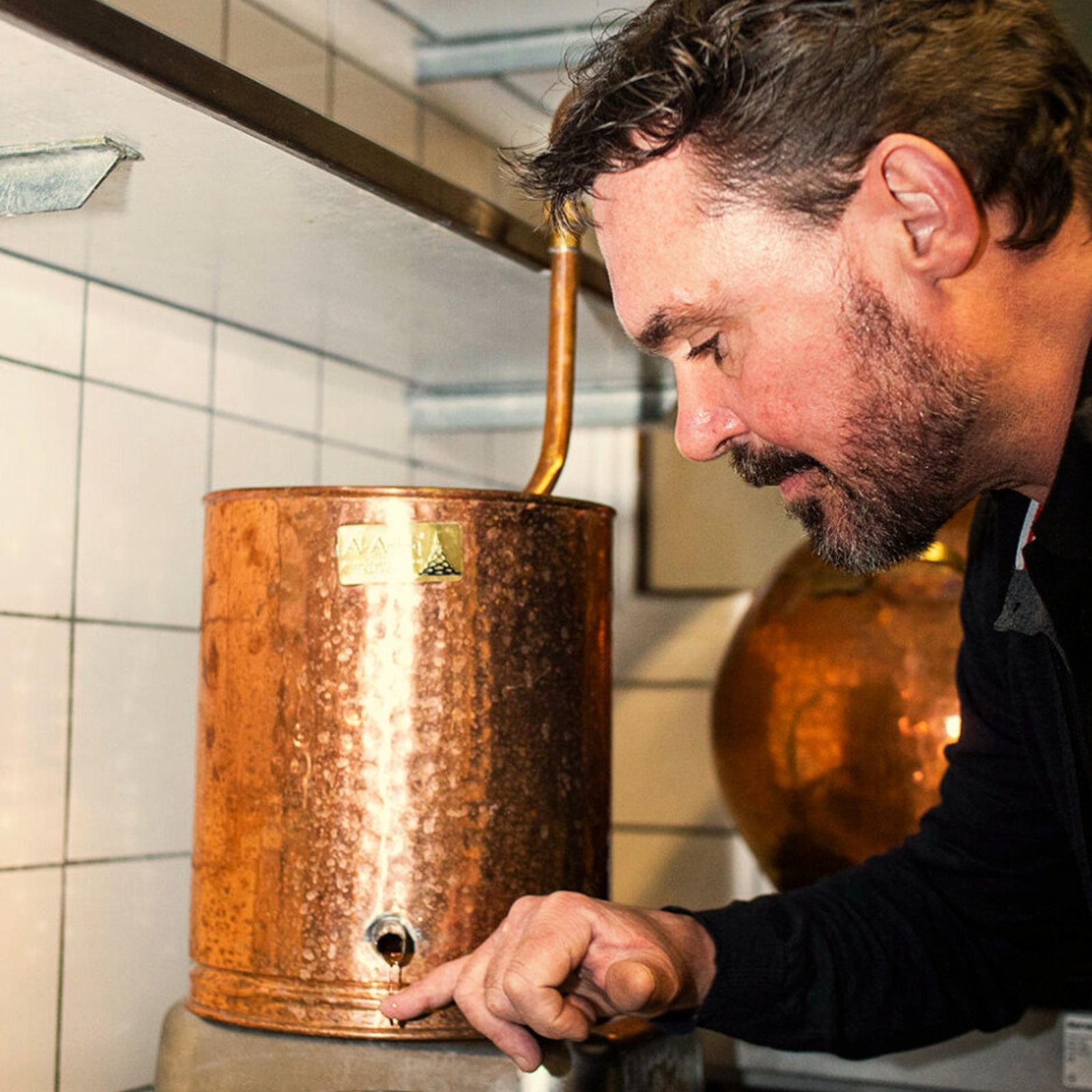 Henrik Hammer, the founder of Hammer & Son tasting a spirit.