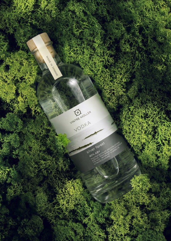 Silver Forest Vodka bottle on a forest bed of moss.